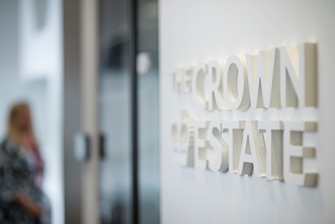 The Crown Estate logo on a wall